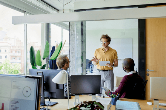 Three men at a business meeting